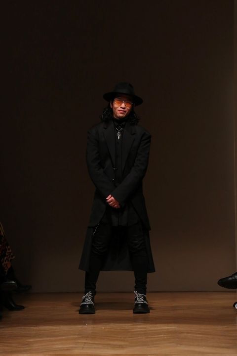 Fashion, Standing, Outerwear, Suit, Coat, Bowler hat, 