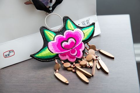 Pink, Fashion accessory, Keychain, Flower, Plant, Material property, Jewellery, 